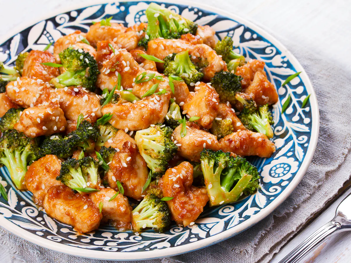 Glazed sesame chicken stir-fried with crisp broccoli florets at Kanji Asian Bistro & Sushi Bar，an Asian Fusion Restaurant in Newark